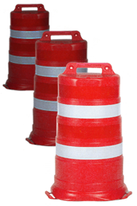 Three orange and white traffic safety drums